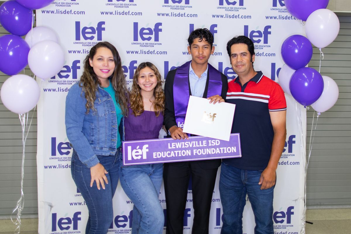 student recipient with family