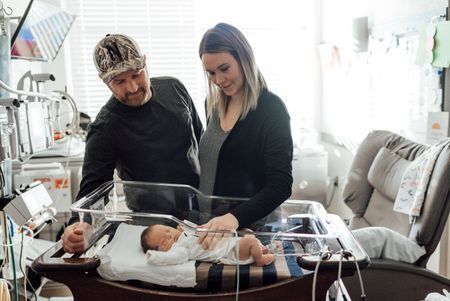 Parents with new born baby