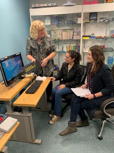 Joanne Castellano demonstrating Assistive Technology Equipment