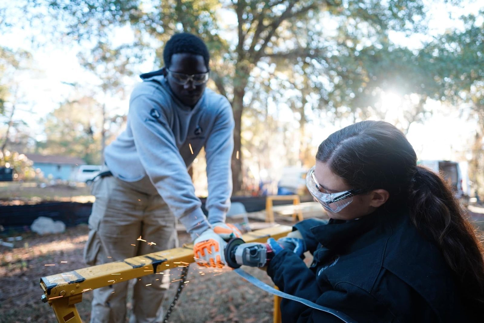 Woman and Man with cutting wood