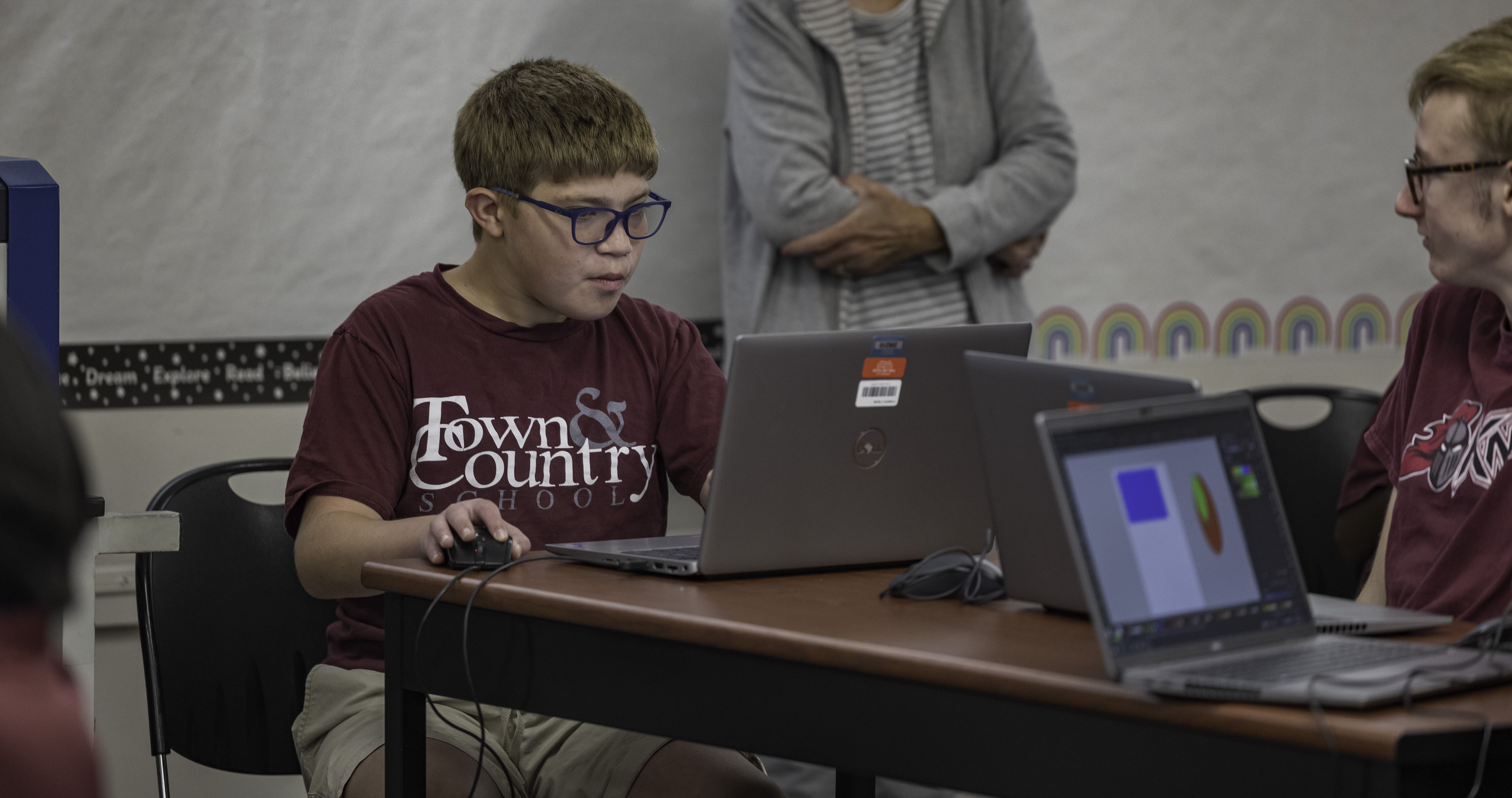 Student looking on a computer 