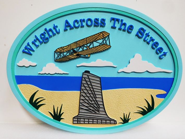 L21945 - Carved and Sandblasted 2.5-D HDU sign for the "Wright Across the Street" Beach House, featuring the Wright Brothers First Aircraft, the Monument and Beach as Artwork