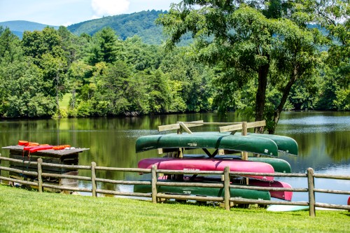 A beautiful lake with canoes.