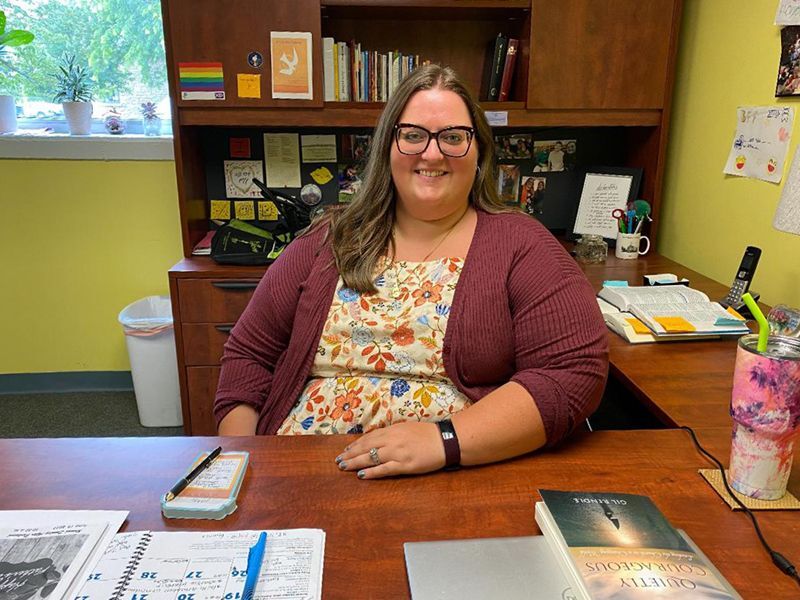 Knob Prairie Church of Christ pastor, Katie Peterson-Madden sits at her desk.