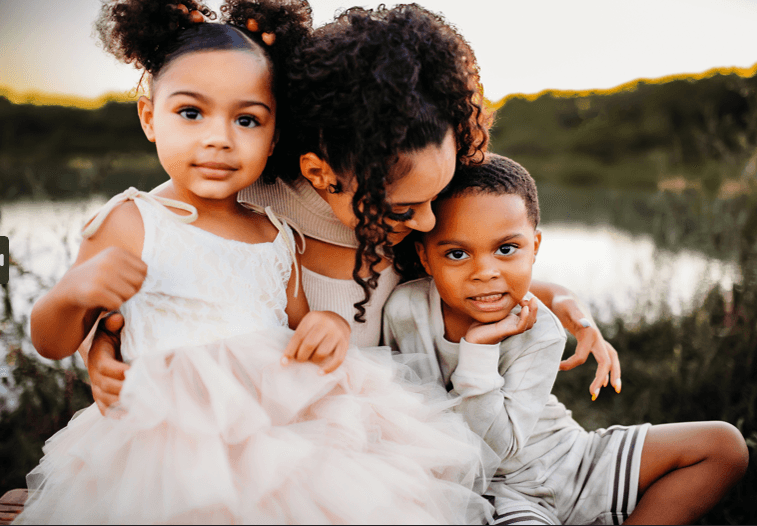 Photo of Cali, Amber, and Caleb, the 2022 Tree of Hope Spokesfamily