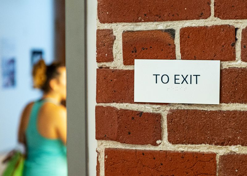 Directional Exit Sign with Braille
