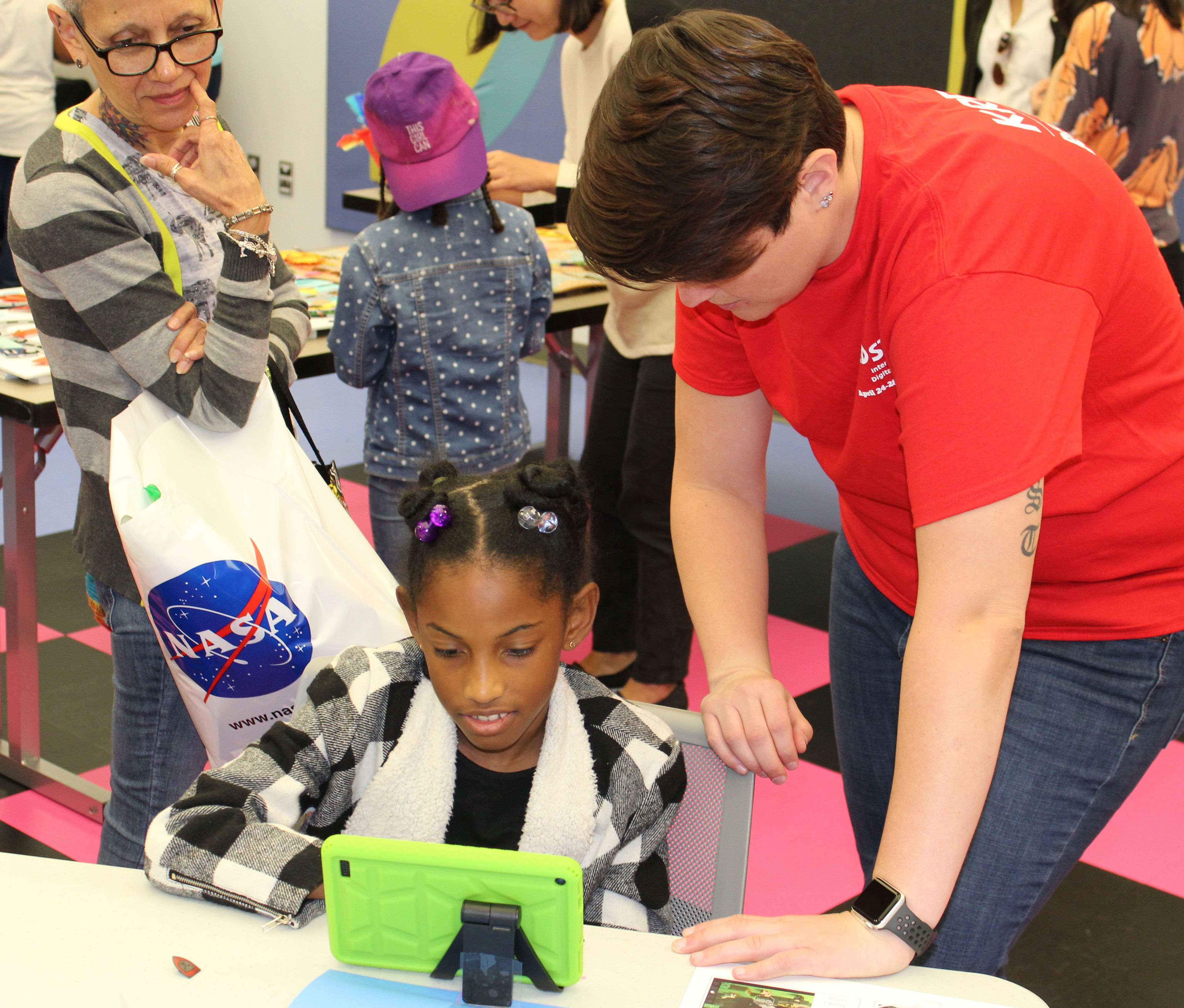 Participant with Jessica Dedon, IBM Volunteer