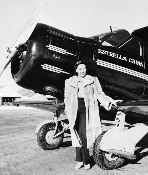 Lee Ya-Ching with Beechcraft ‘ Estrella China’, on her Goodwill Tour, Roosevelt Field, L.I. 1940 (Cradle of Aviation Museum)