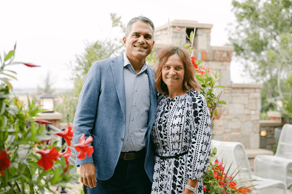 Fred Hunzeker posing with Carly Turner
