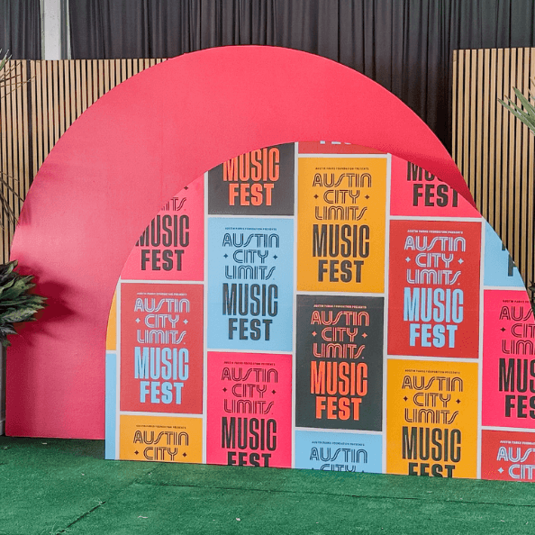 Custom backdrops, signage, and banners throughout the festival grounds