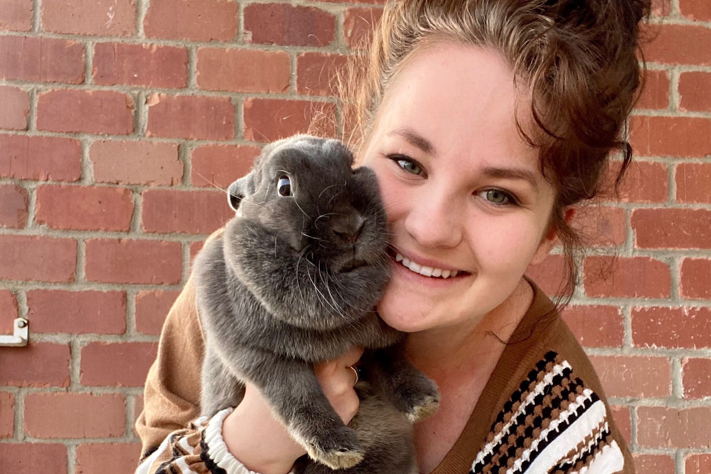 Delaney Patten with her rabbit, Miss Radar
