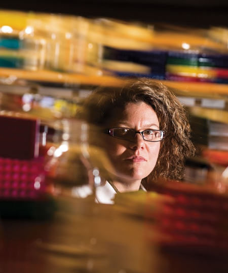 A photo of Dr. Heidi Rehm in the lab