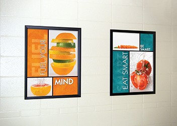 2 food posters in school hallway, food pictures, flip open frames