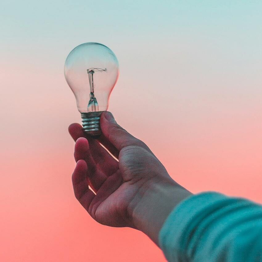 Hand Holding Lightbulb