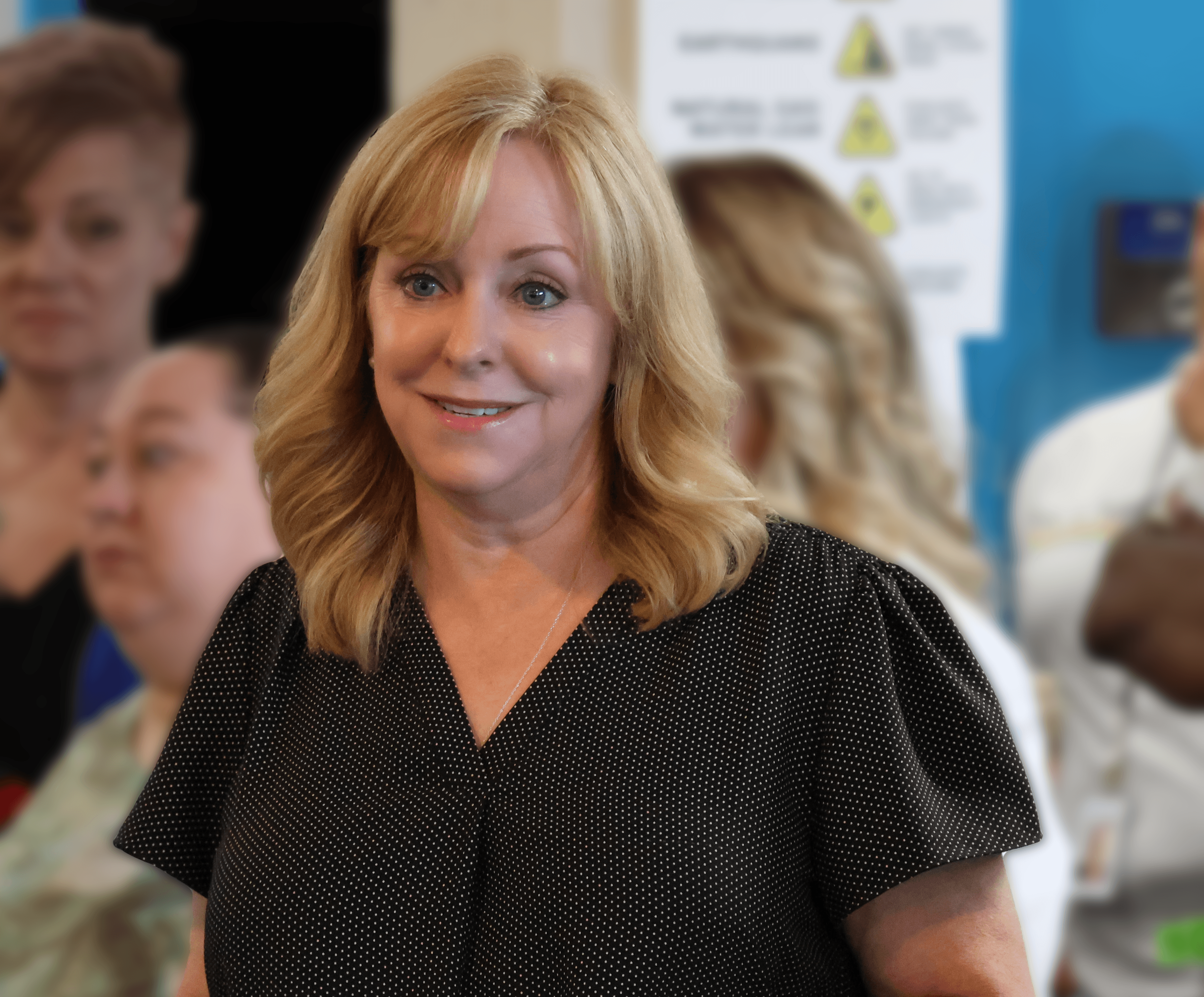 A image featuring Kathy Kay, the new CEO of The Whole Person, interacting with staff members during a welcoming event. The images show her smiling, conversing, and engaging with the team, along with other team members.