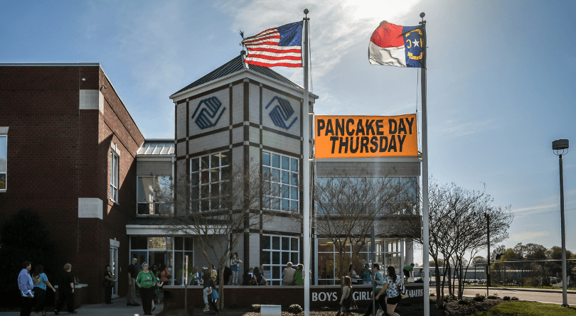 Outside front of building on Pancake Day