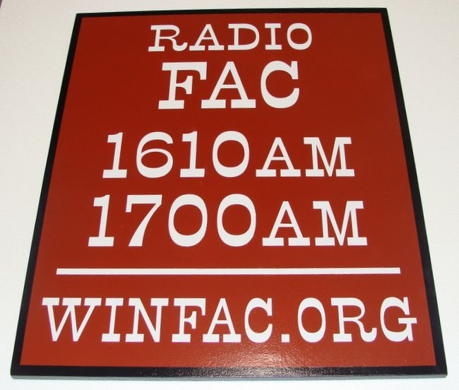 SA28590 - Sign for Radio Station with Radio Frequencies and Website Address