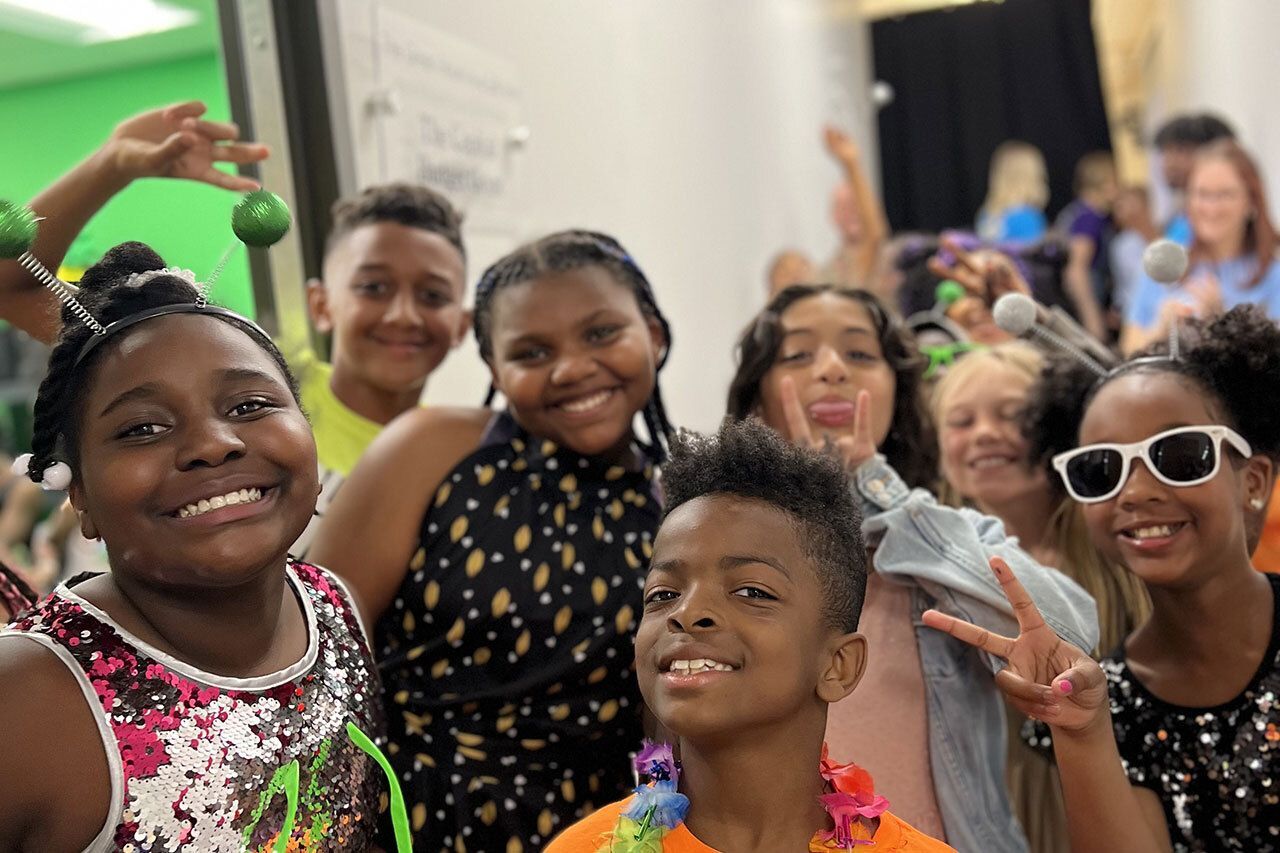 A group of smiling children.