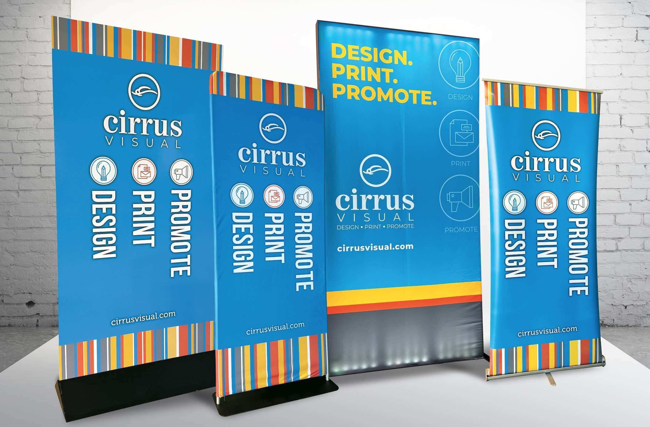 Multiple banner stands styles including rollup banner stand, back-lit banner stand, tension fabric banner stand, and recyclable corrugated cardboard banner stand