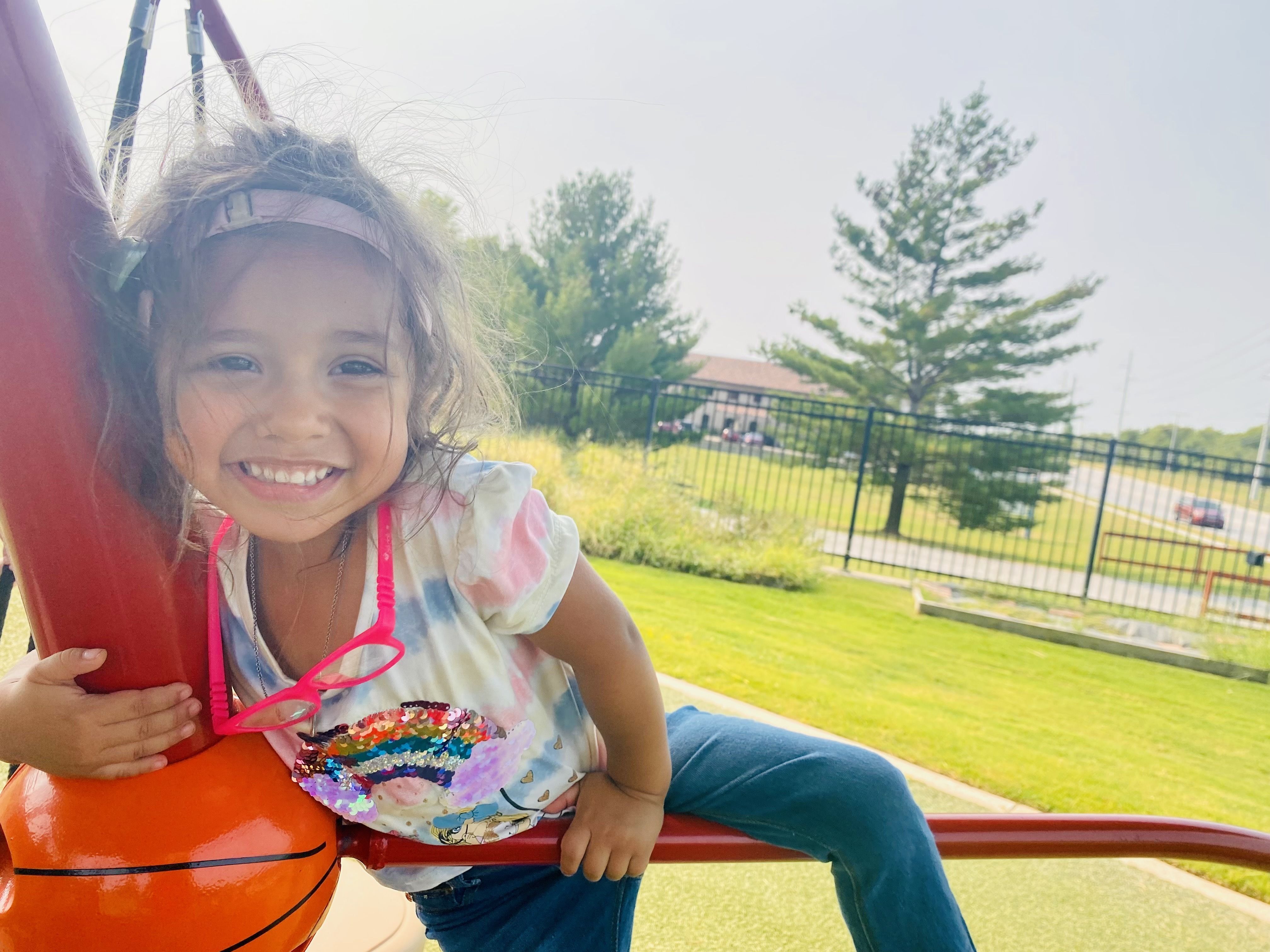 Boy on playground equipment