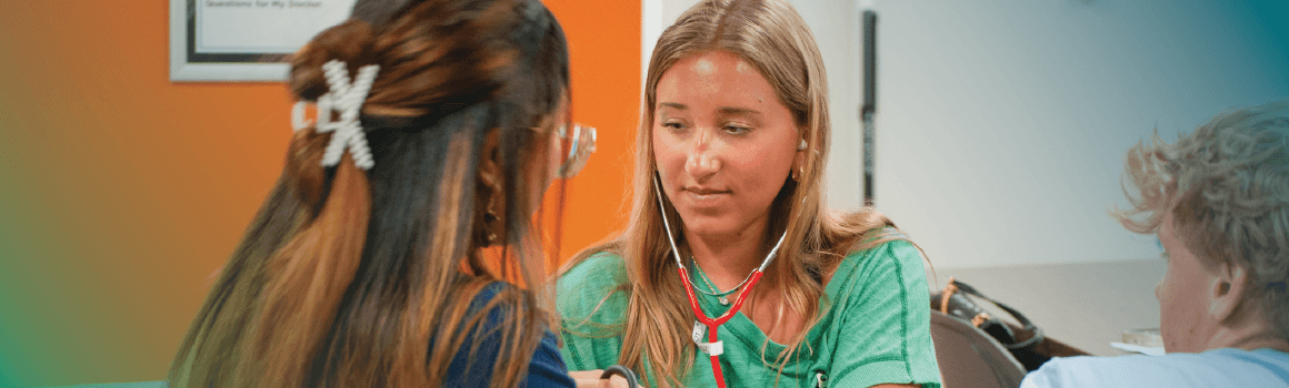 nursing student practicing vitals