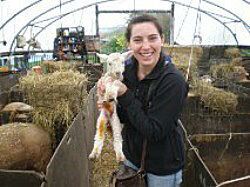 Jesa Marsh with a newborn lamb