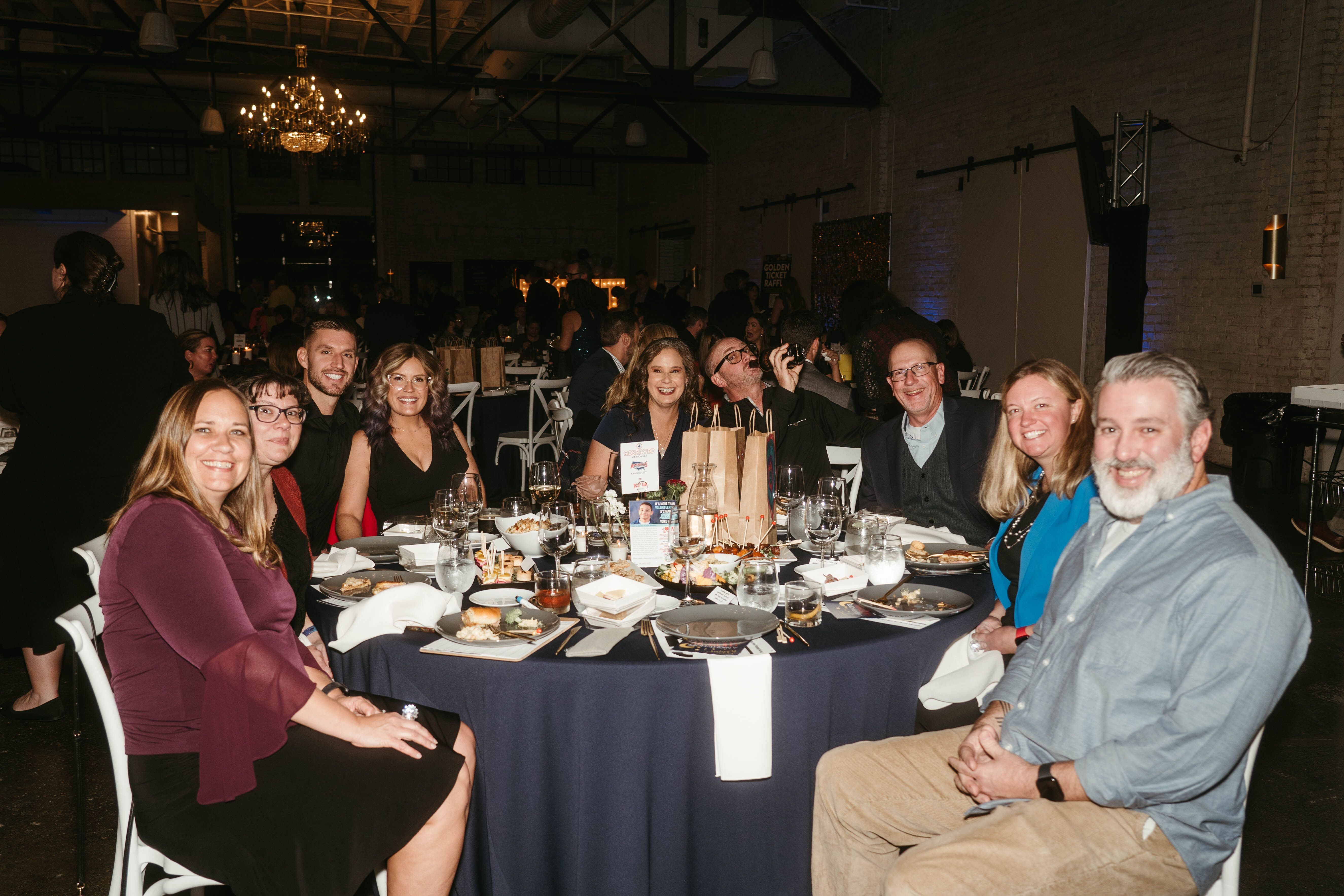 a table of guests at Cocktails for CASA--A Night of Hope