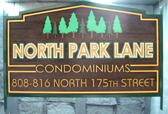 K20154 - Carved and Sandblasted HDU Condominium Sign "North Park Lane" with Evergreen Trees