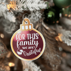 Paper ornament hanging on a Christmas tree