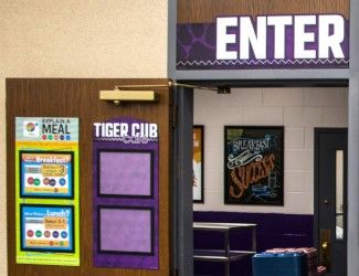Custom Menu board options in school cafeteria, custom signs in purple with paper holder, enter sign