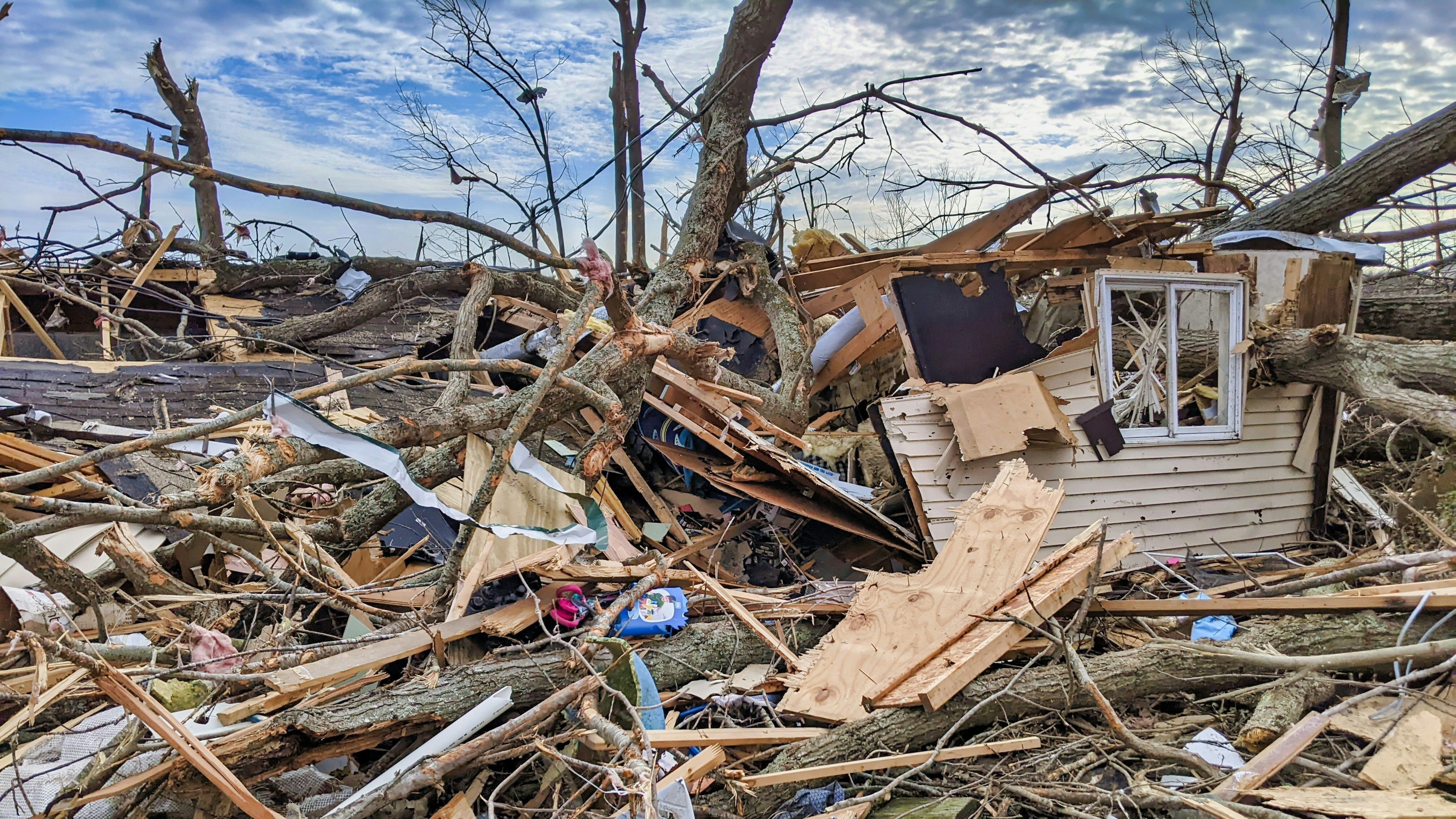 The aftermath of a tornado on a home
