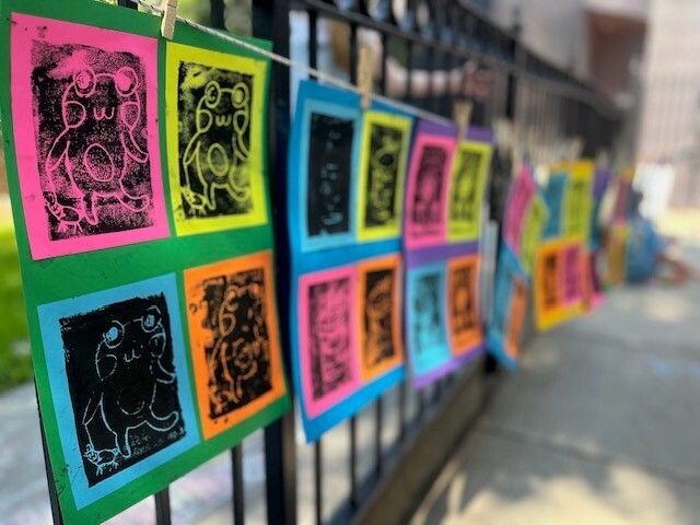 colorful Styrofoam relief prints hanging on clothesline