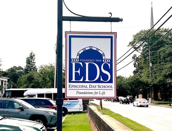 Custom ADA-compliant signs including restroom, wayfinding, and room identification signs for a medical office