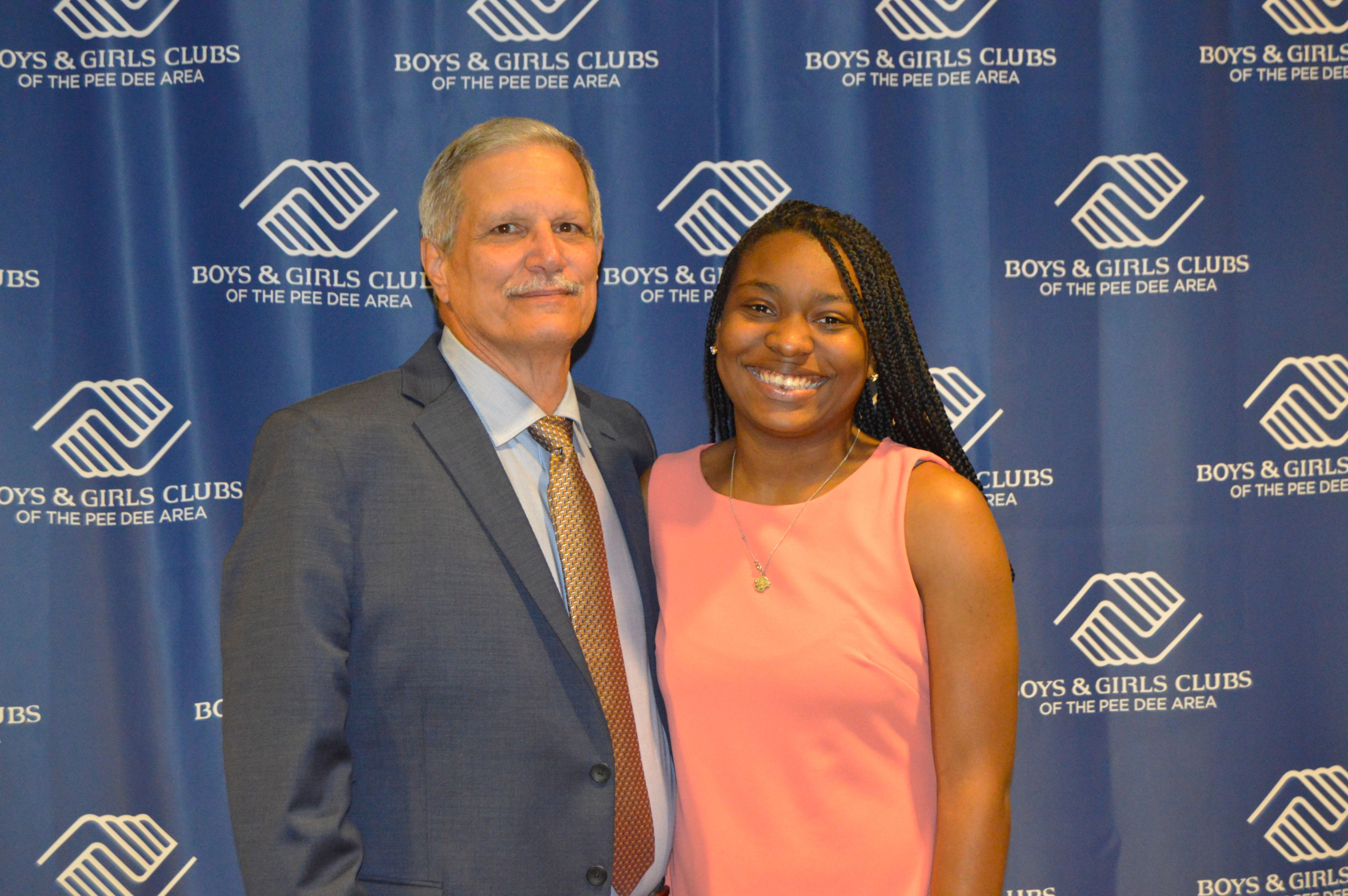 Boys & Girls Clubs of the Pee Dee Area Executive Director Neal Zimmerman stands with Genesis Majors, the 2025 South Carolina Youth of the Year.