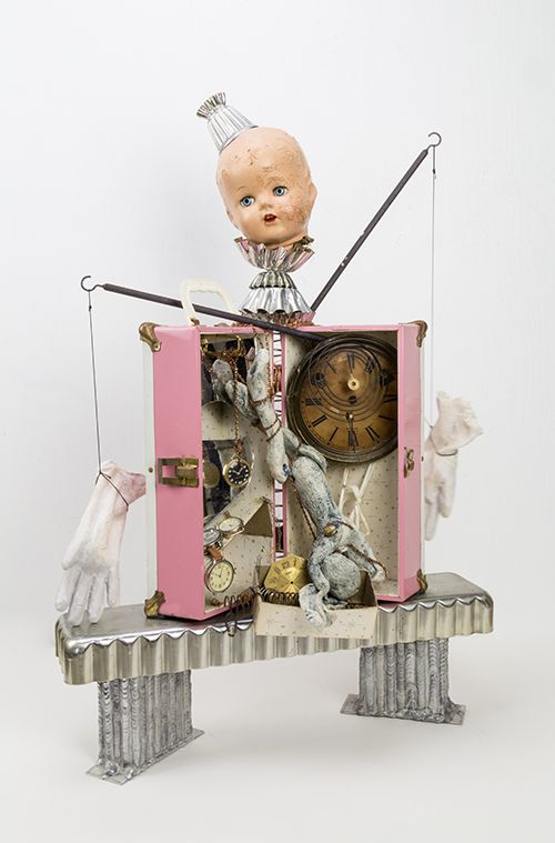 Ever After, Assemblage, found objects, ceramic gloves & rabbit, 30.5" x 23" x 12""