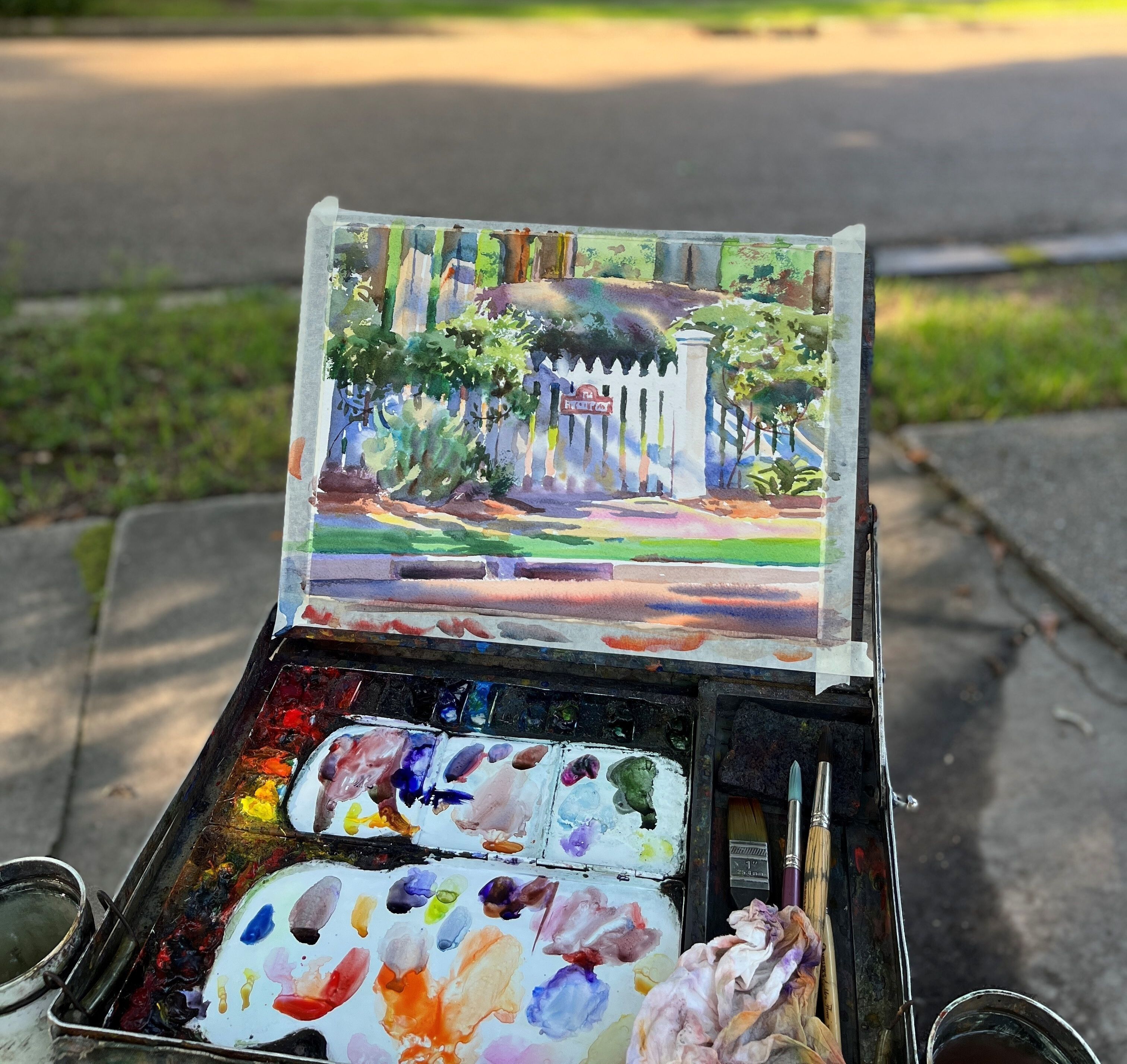 Watercolor painting on outdoor easel