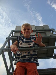 This is a picture of Jack (the blogger's son) waving at the camera