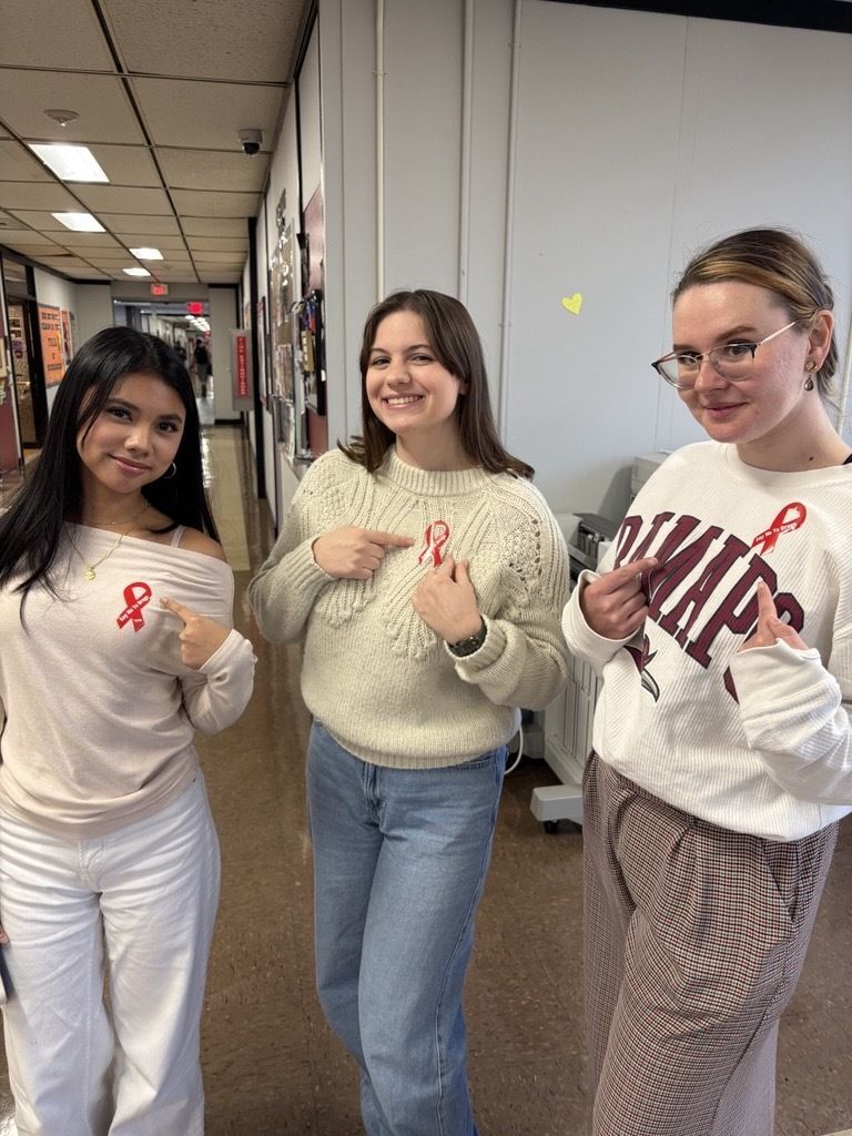 BCHEAP members at a table covered with resources