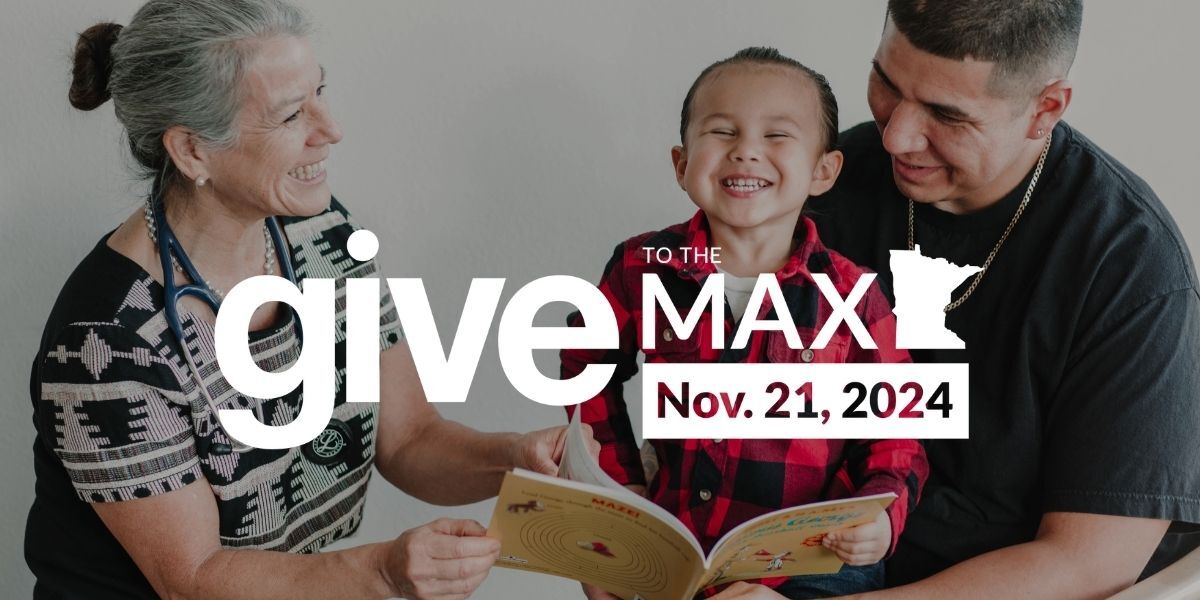 Give to the Max: Nov 21, Father, son, Pediatrician read together