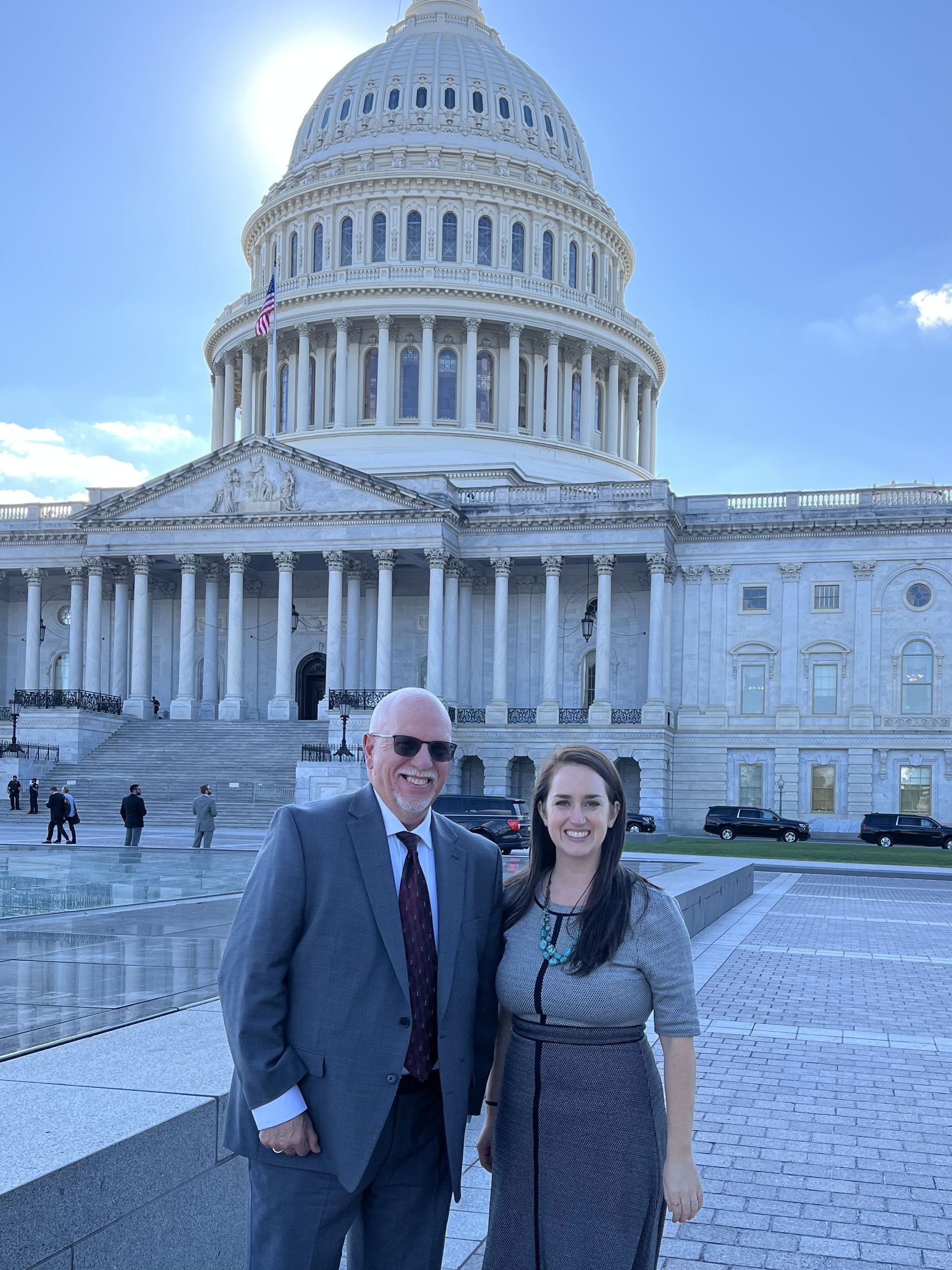 Jessica Moerman and Tim Olsen standing in front of the U.S. capitol