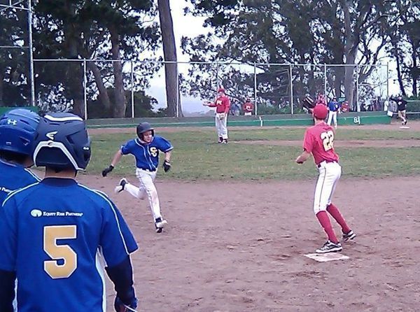 Batter up! It's time for Little League baseball summertime fun