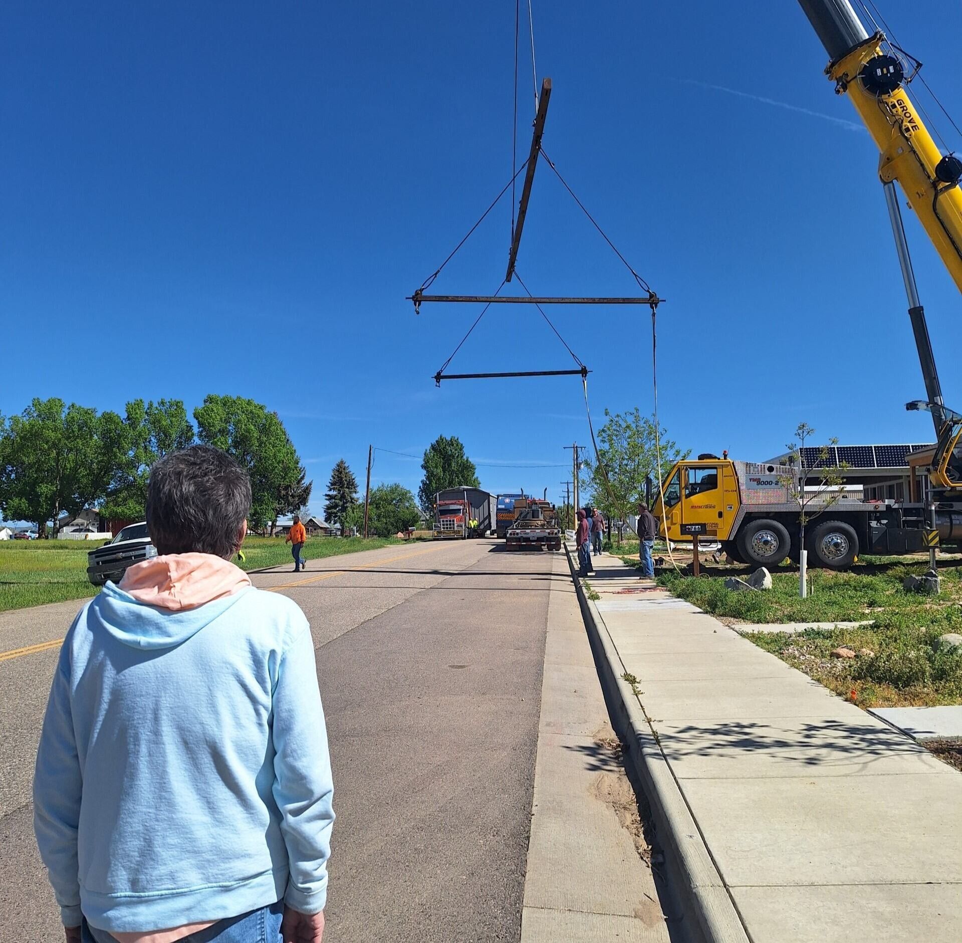 Trilby seeing her new home being craned into its foundation.