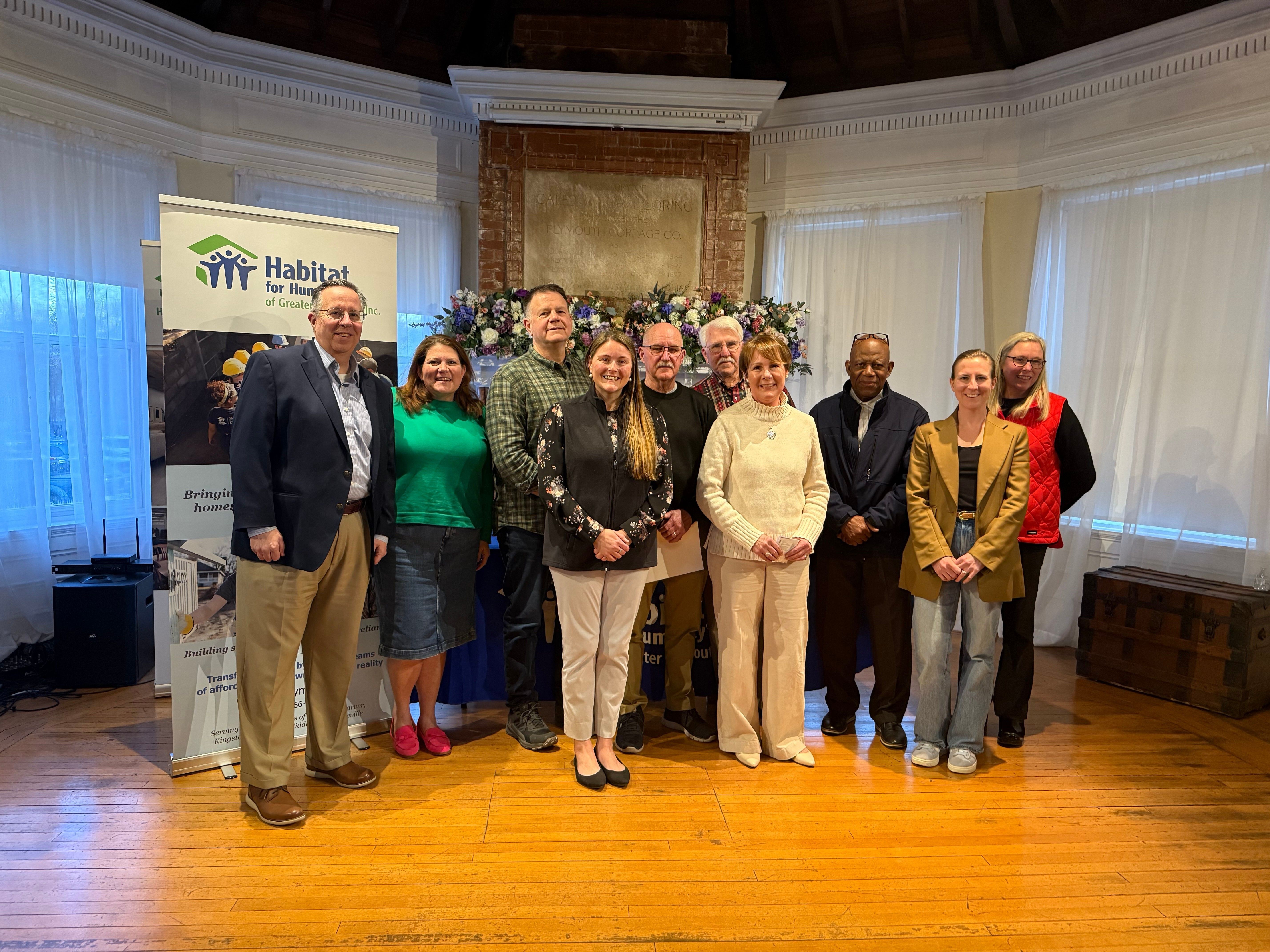 Photo of 10 men & women from the HFHGP Board of Directors