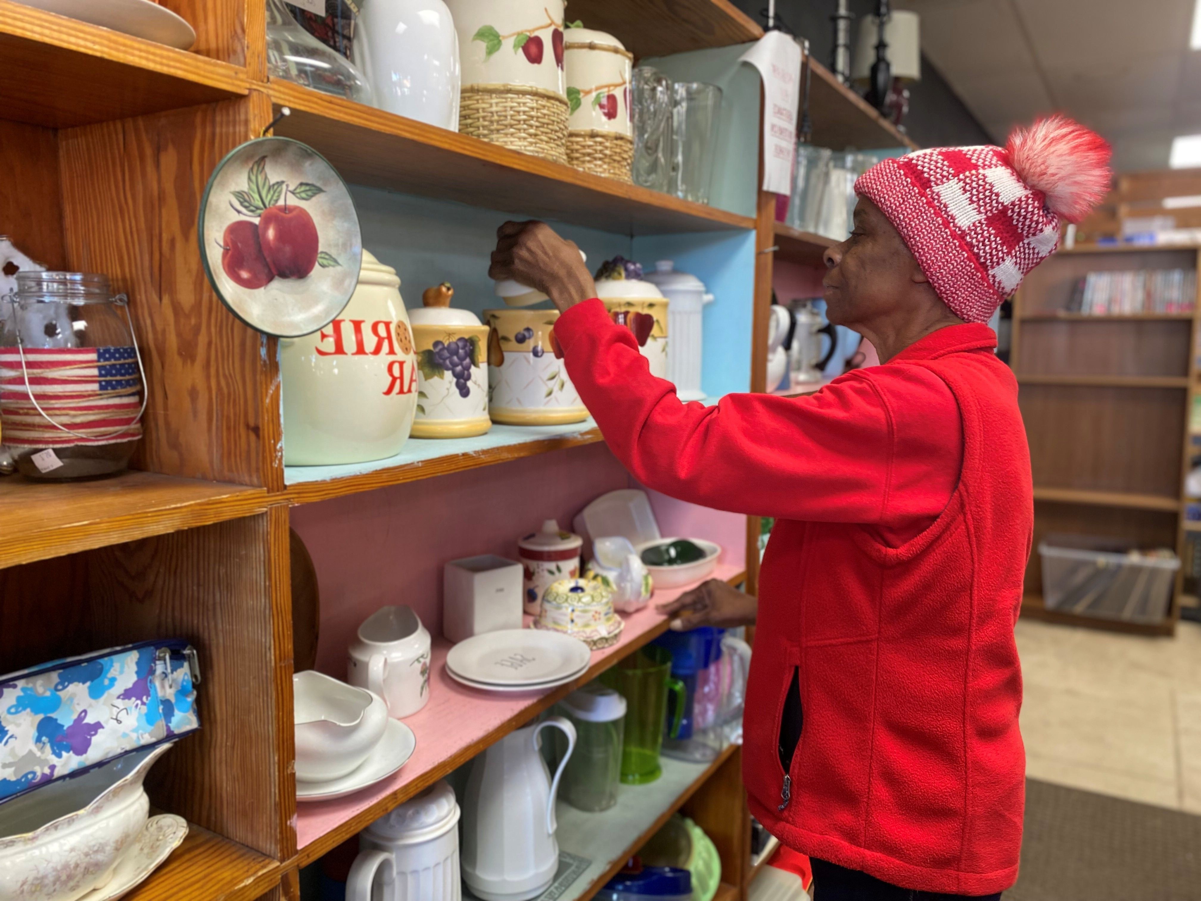 woman volunteers in Habitat ReStore