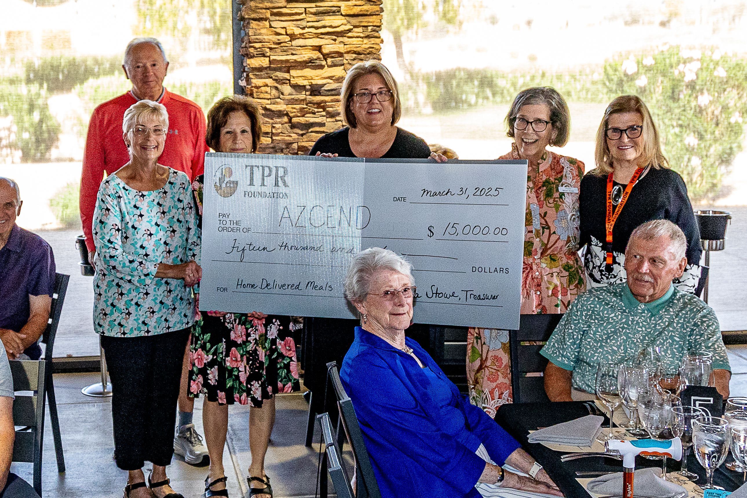 TPR Foundation Board members present $15,000 check to AZCEND. 