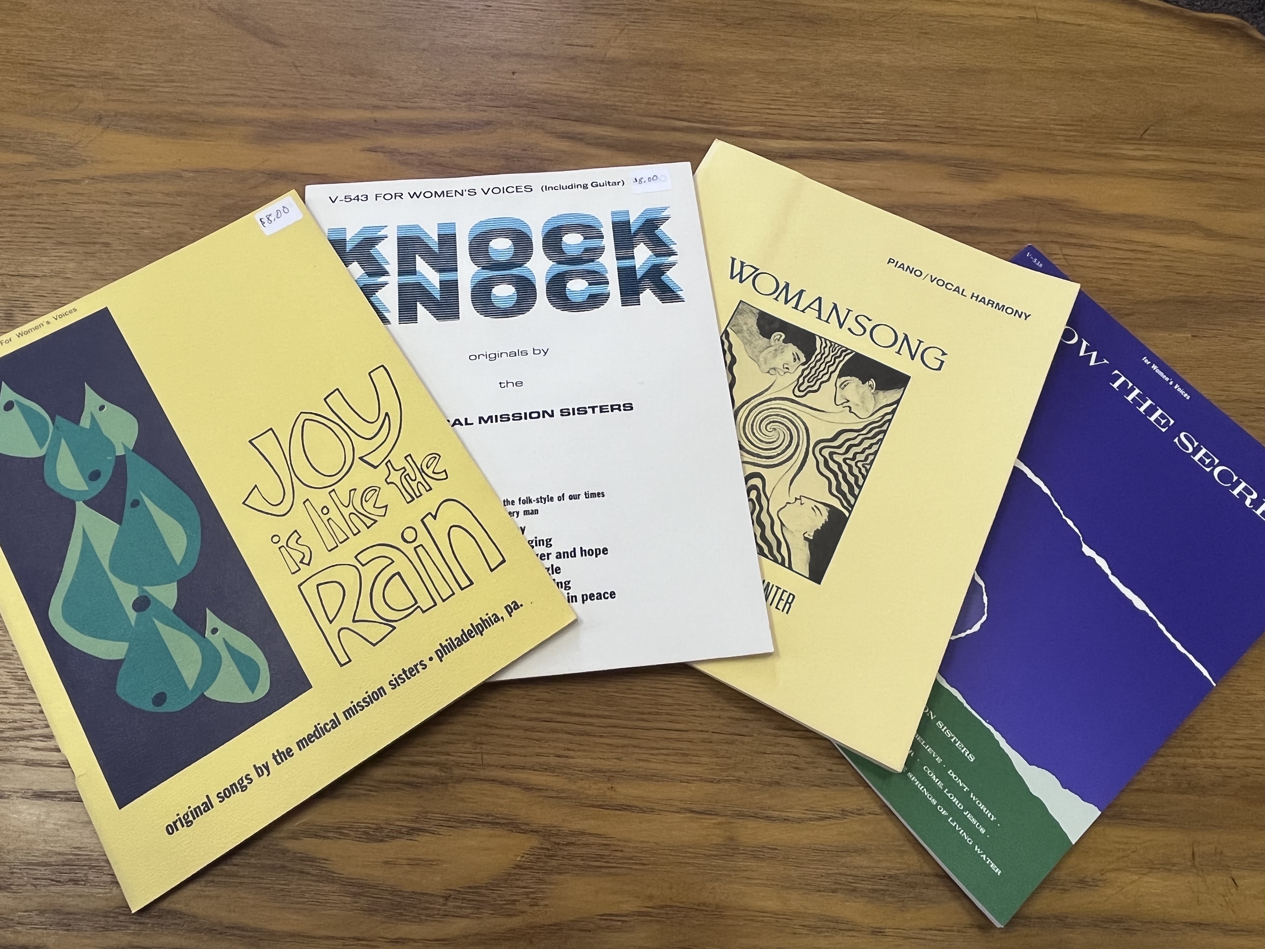Four Songbooks (Joy is like the Rain, I Know the Secret, Knock Knock, and Womansong