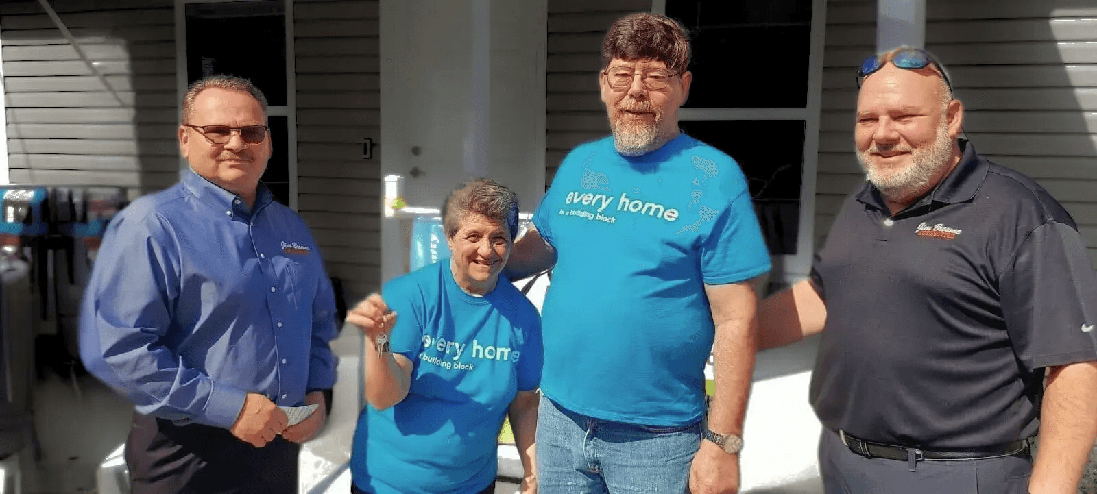 Habitat for Humanity home dedication in Dade City, Florida, with new homeowners and community partners in Dade City