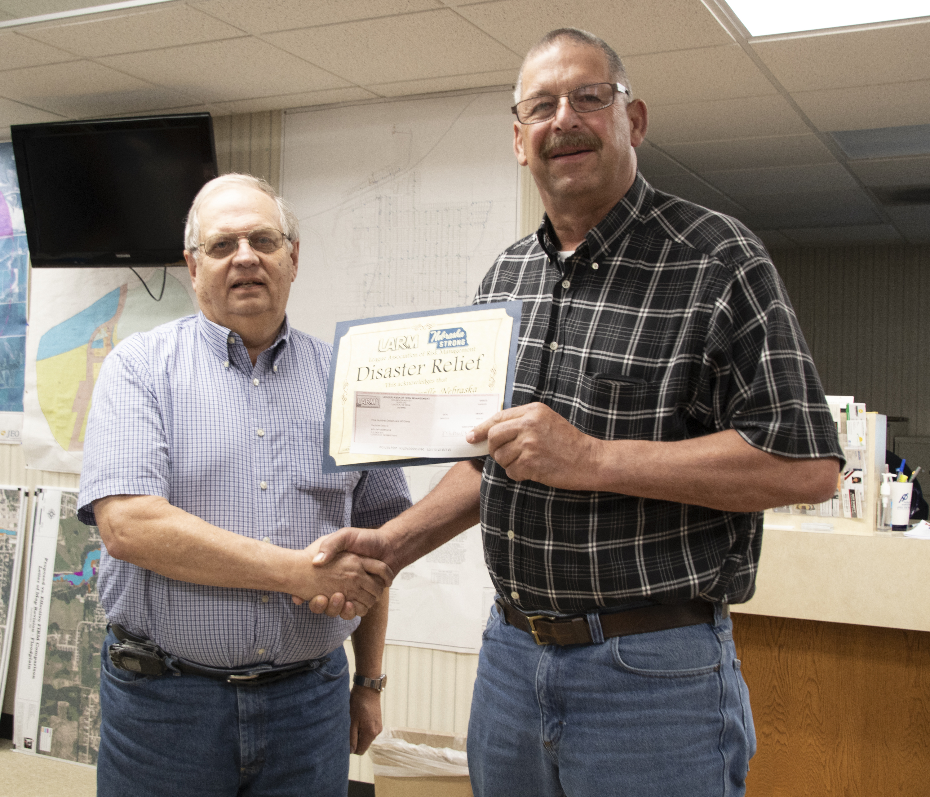 City of Louisville receives disaster funds from LARM