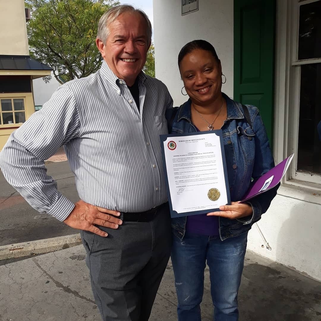 Volunteers paint the towns purple.