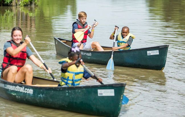Group of kids canoeing